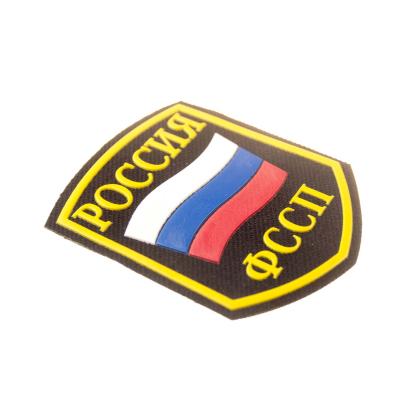 Где купить Шеврон пластизолевый Россия ФССП (5-уг. с флагом) в Москве недорого
