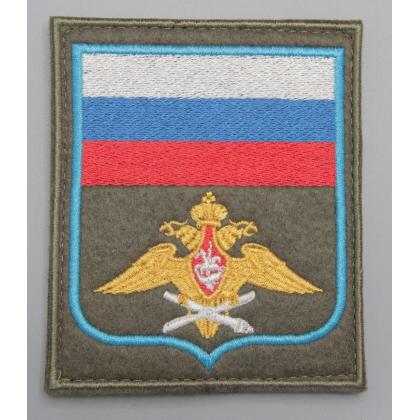 Где купить Шеврон вышитый Воздушно-космические силы (с флагом РФ) оливковый фон (на липучке) приказ № 300 в Москве недорого с доставкой по России