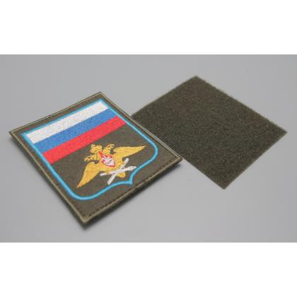 Где купить Шеврон вышитый Воздушно-космические силы (с флагом РФ) оливковый фон (на липучке) приказ № 300 в Москве недорого с доставкой по России