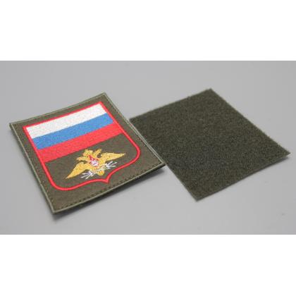 Где купить Шеврон вышитый Войска связи (с флагом РФ) оливковый фон (на липучке) приказ № 300 в Москве СПб недорого с доставкой по России