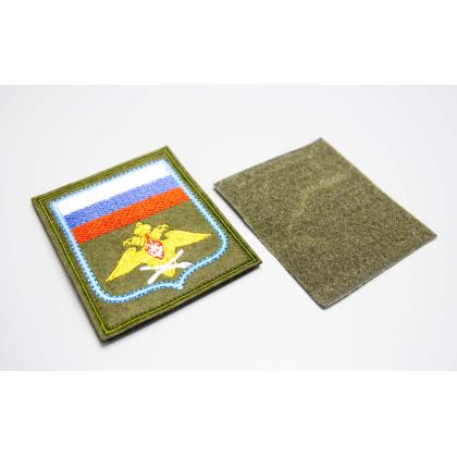 Где купить Шеврон вышитый ВВС (с флагом РФ) оливковый фон (на липучке) приказ № 300 от 22.06.2015 в Москве недорого