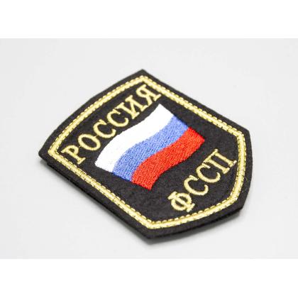 Где купить Шеврон вышитый РОССИЯ ФССП, черное поле нить(металл золото) с липучкой в Москве недорого