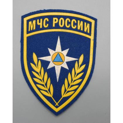 Где купить Шеврон пластизолевый МЧС России (щит) синий недорого в Москве с доставкой по России