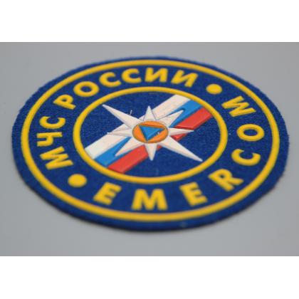 Где купить Шеврон пластизолевый МЧС России EMERCOM (8,5 см) синий фон недорого в Москве с доставкой по России
