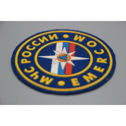 Где купить Шеврон пластизолевый МЧС России EMERCOM (8,5 см) синий фон недорого в Москве с доставкой по России