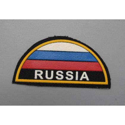 Где купить Шеврон пластизолевый Россия (полукруг МЧС триколор) на черном фоне  ( 9x5 ) недорого в Москве с доставкой по России